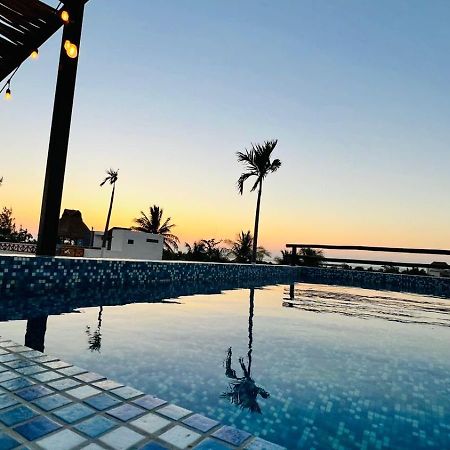 Hotel Mayari Holbox Luaran gambar Sunset at the pool