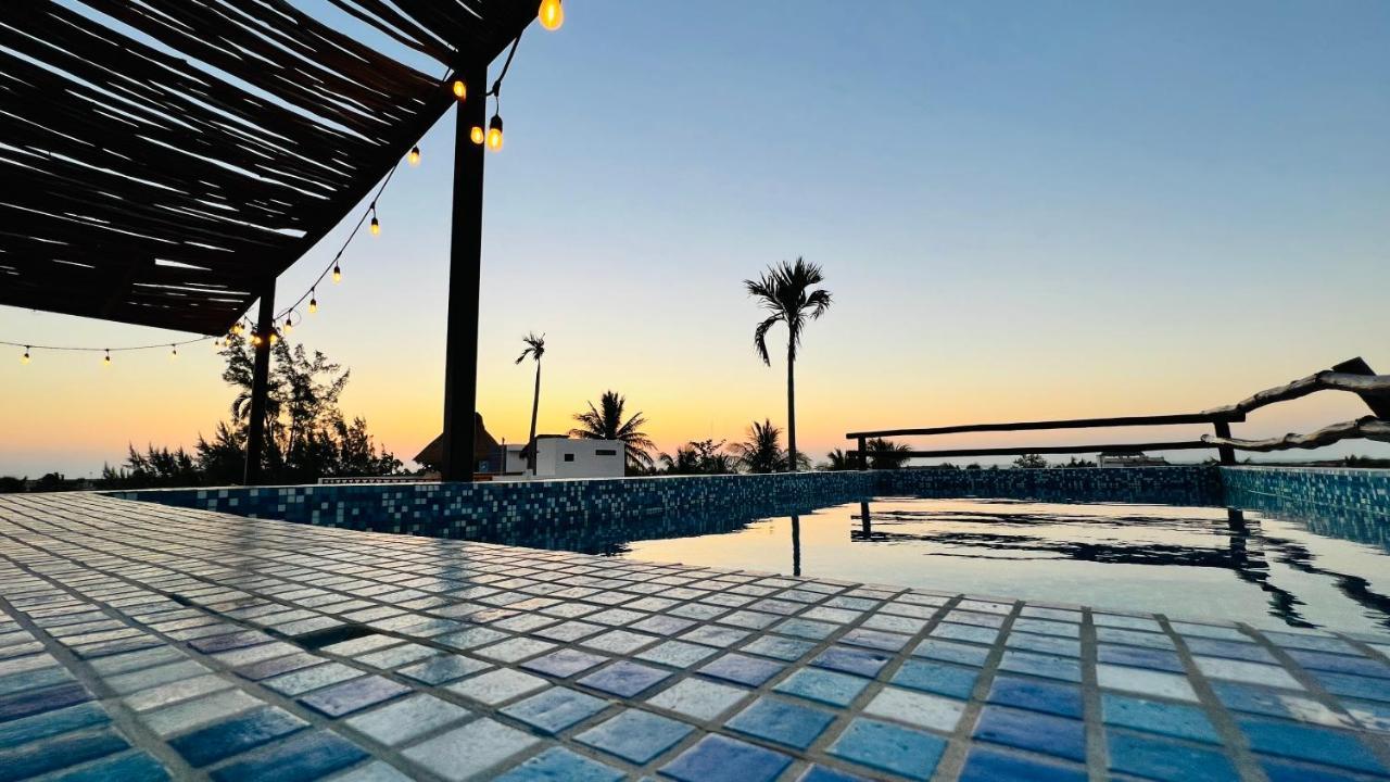 Hotel Mayari Holbox Luaran gambar Sunset at the pool
