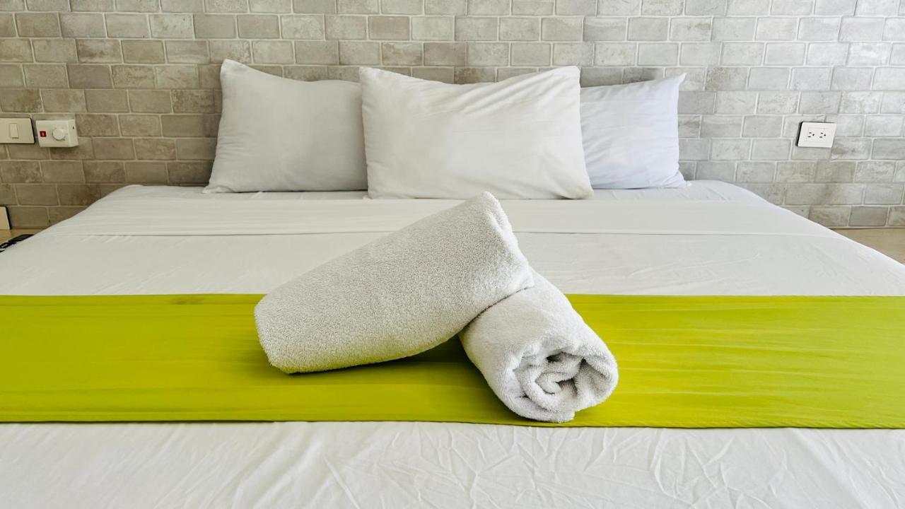 Hotel Mayari Holbox Luaran gambar Bath towels on a bed